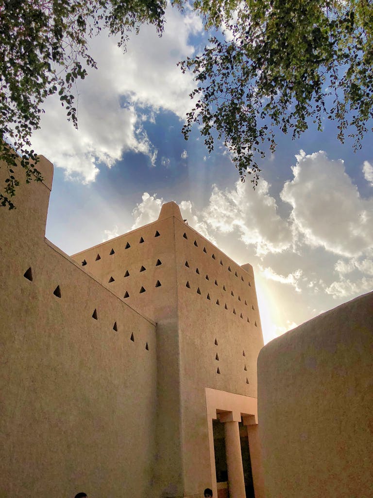 Historic Al Masmak Fort against a bright sky in Riyadh, showcasing traditional Saudi architecture.